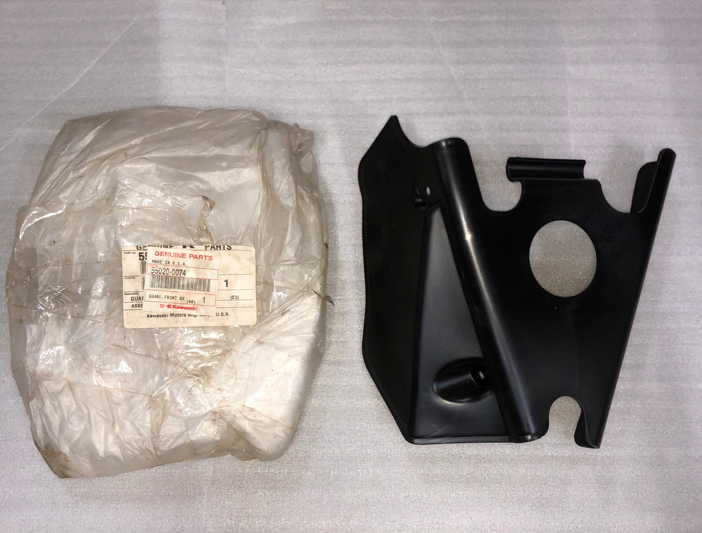 KAWASAKI - FRONT AXLE GUARD